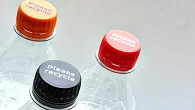 Packaging caps on bottles